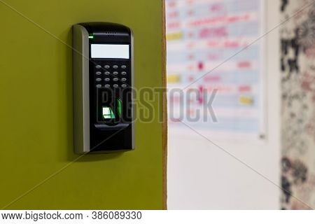 Finger Scan On Machine Security Concept And Safety. Soft Focus On Hand Scanning Finger On Machine Co