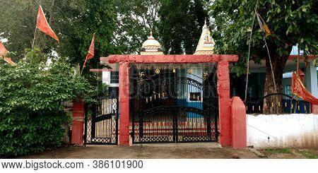District Katni, India - September 04, 2019: Hindu Religious Temple Entry Gate View On Green Trees Ba