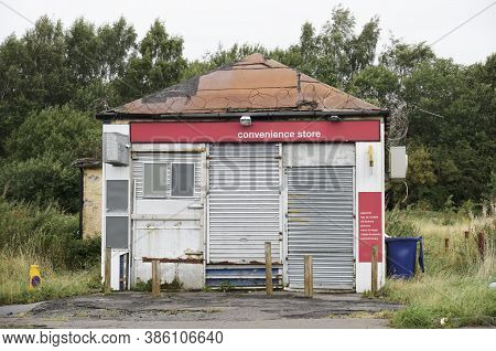 Derelict Abandoned Shop Business In Poor Housing Crisis Ghetto Estate Slum Paisley