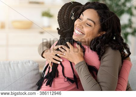 Beautiful Black Women Hugging Her Friend, Home Interior, Empty Space