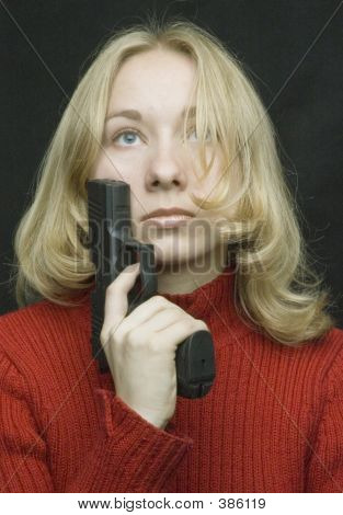 ein Mädchen mit der Pistole