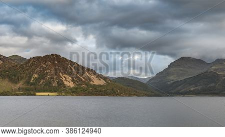 Stunning Landscape Image Looking Across Ennerdale Water In The English Lake District Towards The Pea