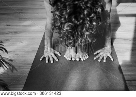 Standing Forward Bend Pose In Yoga Iyengar, Uttanasana Fold Pose Close Up Front View