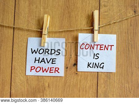 Wooden Clothespins With White Sheets Of Paper. Text 'words Have Power, Content Is King'. Beautiful W