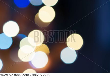Christmas, New Year, Holiday Blurred Background From Lights Garlands In The Evening.