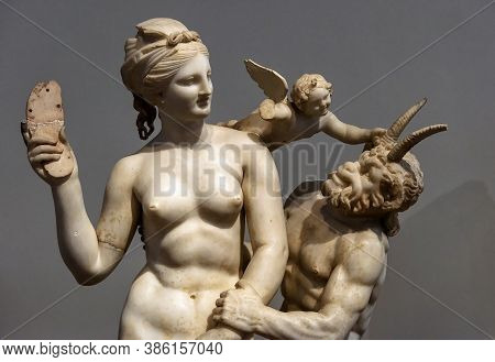 Athens - May 7, 2018: Marble Sculpture Of Aphrodite, Pan And Eros In National Archaeological Museum 