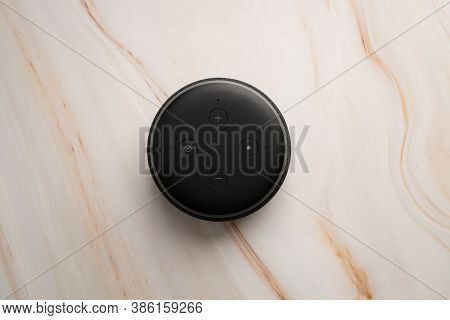 London, United Kingdom - September 20 2020: Close-up Of An Amazon Echo Dot, The Virtual Assistant Sp