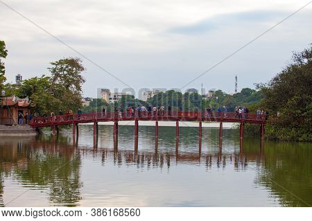Hanoi, Vietnam - October 21, 2019 : Hanoi red bridge. The wooden red painted bridge over the Hoan Ki