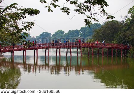 Hanoi, Vietnam - October 21, 2019 : Hanoi red bridge. The wooden red painted bridge over the Hoan Ki