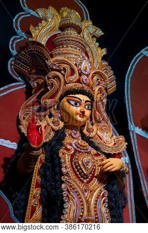 Idol Of Goddess Laxmi At Decorated Durga Puja Pandal, Durga Puja Festival At Night. Shot Under Color
