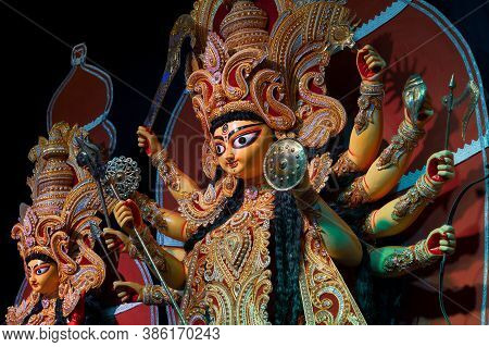 Goddess Durga Idol , Durga Puja Festival At Night. Shot Under Colored Light At Howrah, West Bengal, 