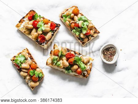 Goats Cheese Crostini With Garlicky Beans On A White Background, Tp View