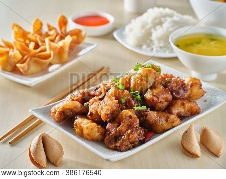 chinese general tsos chicken meal with crab rangoon and egg drop soup