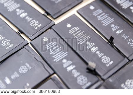 Russia - July 27, 2020: Broken Iphone Apple Phone Used Rechargeable Batteries In Recycling Chip Repa