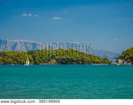 Saiing ship in the bay of Nidri in Greece