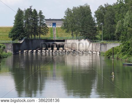 Dam Reflected In Waters Of Pond In European Goczalkowice Town At Silesian District In Poland, Clear 