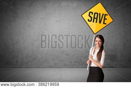 Young business person holding road sign with SAVE inscription, new rules concept