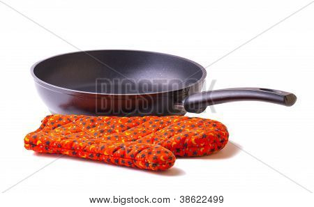 pan and red kitchen mitten