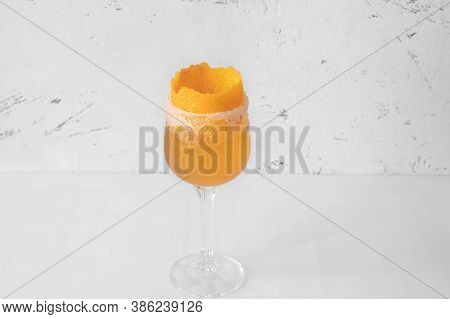 Glass Of Brandy Crusta Cocktail Garnished With Orange Zest