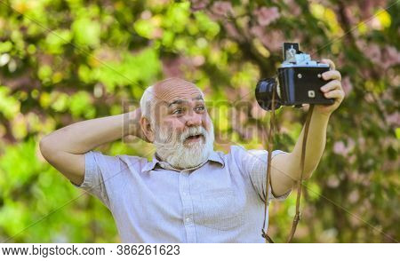 Everyone Photogenic. Senior Man Taking Selfie Photo Vintage Camera. Self Portrait. Memories In Snap.