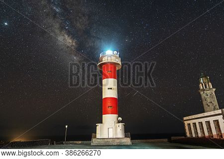 Fuencaliente Lighthouse With The Milky Way Diagonally At Night On The Route Of The Volcanoes South O