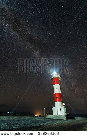 Fuencaliente Lighthouse With The Milky Way Diagonally At Night On The Route Of The Volcanoes South O