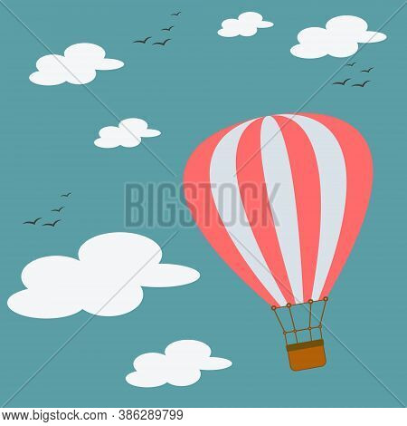 A Red And White Balloon Flies In The Sky With Birds Flying Near The Clouds