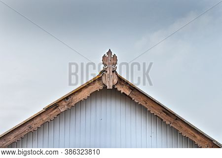 Beautiful Wooden Decoration On The Traditional Fronton House In Danube Delta Region, Using Fretwork 