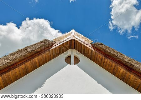 Beautiful Wooden Decoration On The Traditional Fronton House In Danube Delta Region