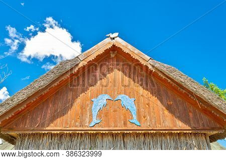Beautiful Wooden Decoration On The Traditional Fronton House In Danube Delta Region