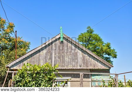 Beautiful Wooden Decoration On The Traditional Fronton House In Danube Delta Region