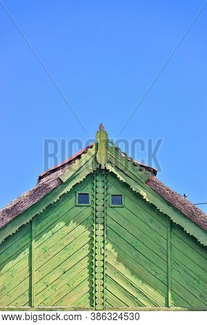 Beautiful Wooden Decoration On The Traditional Fronton House In Danube Delta Region