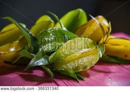 Natural Fruits Of Carambola (averrhoa Carambola) On Pink Background
