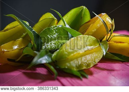 Natural Fruits Of Carambola (averrhoa Carambola) On Pink Background