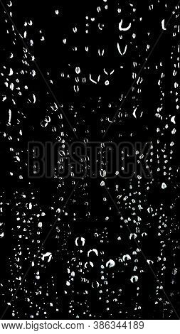 Rain Drop On The Glass In The Blackbackground