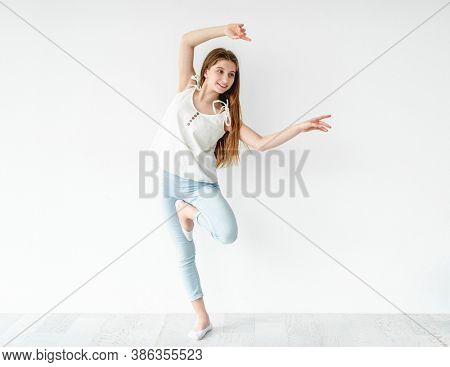 Cute young girl dancing contemp