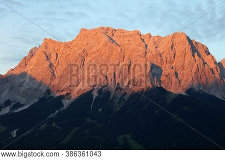 Zugspitze Mountain Glowing Seen From Lermoos. Tyrol. Austria