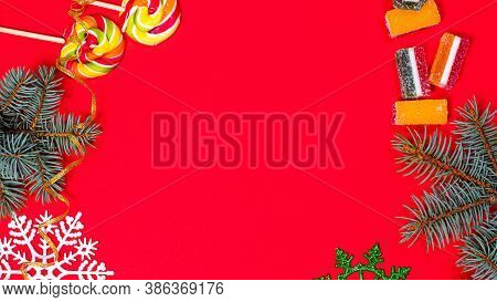 Leneds On A Stick And Marmalade On A Red Background With A Place For Text. Banner For Confectionery 