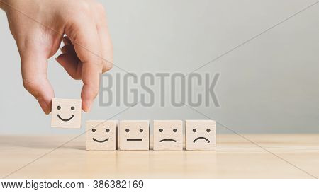 Hand Choose Wooden Cube Block With Icon Face Smile, The Best Excellent Business Services Rating Cust