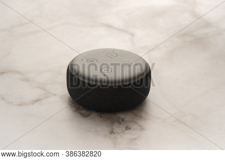 London, United Kingdom - September 20 2020: Close-up Of An Amazon Echo Dot, The Virtual Assistant Sp