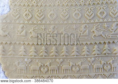 Dough Rolled Out On The Table With A New Year's Pattern. Making Cookies On The New Year's Table, A F