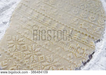 Dough Rolled Out On The Table With A New Year's Pattern. Making Cookies On The New Year's Table, A F