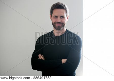 Happy Mature Man With Grey Beard Hair Smile With Confidence Indoors, Unshaven.