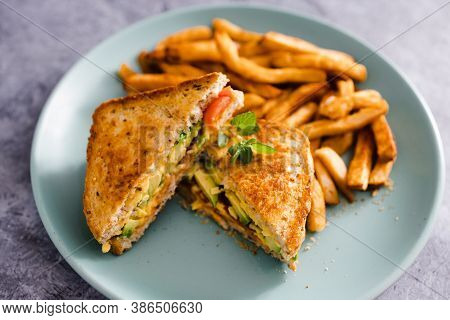 Plant-based Food,  Vegan Avocado Tomato And Dairy-free Cheese Sandwiches With French Fries