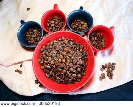 Lot Of Roasted Coffee Beans In A Ceramic Bowl