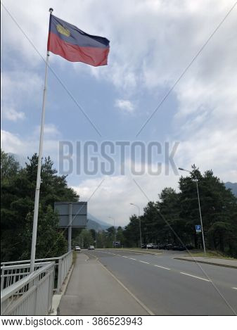 Liechtenstein Flag Is Waving In The Wind At The Bridge In Balzers 9.7.2019
