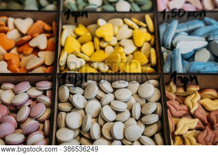 Pet Shop. Dog And Cat Vitamins Supplements On Animals Supermarket Shelf. Multi-colored Tablets Vitam