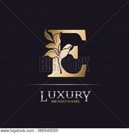 Golden Initial Letter E. Elegant Design Letter E With Floral Branch. Luxury Gold Logo Icon. Vintage 
