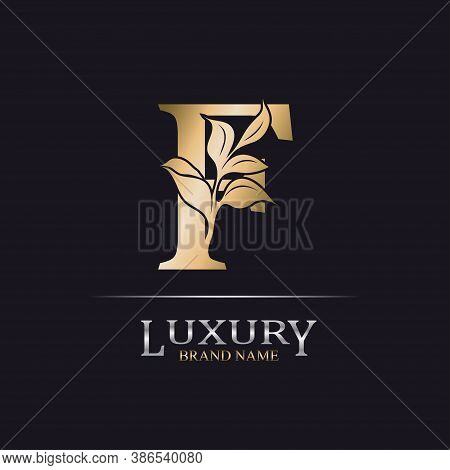Golden Initial Letter F. Elegant Design Letter F With Floral Branch. Luxury Gold Logo Icon. Vintage 