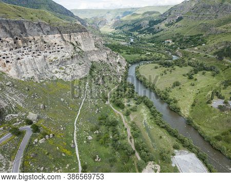 Aerial View To Vardzia Cave Monastery - Excavated From Erusheti Mountain On The Left Bank Of The Mtk